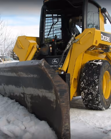 john deer removing snow